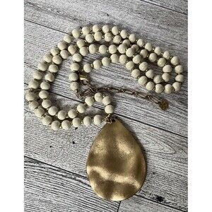 Long White Wooden Bead Necklace with Gold Tone Teardrop Pendant 18"